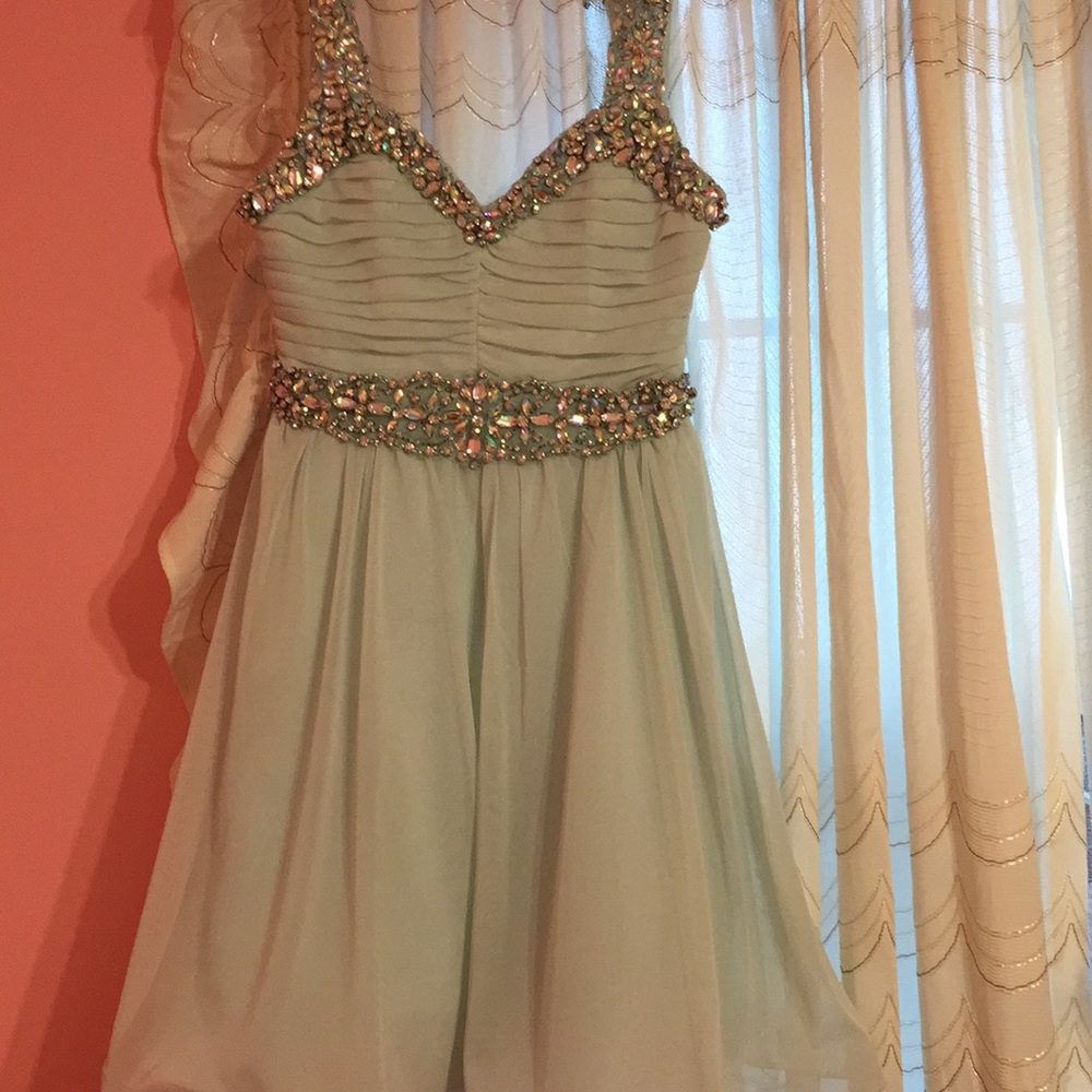 I’m selling a shirt jeweled elegant dress